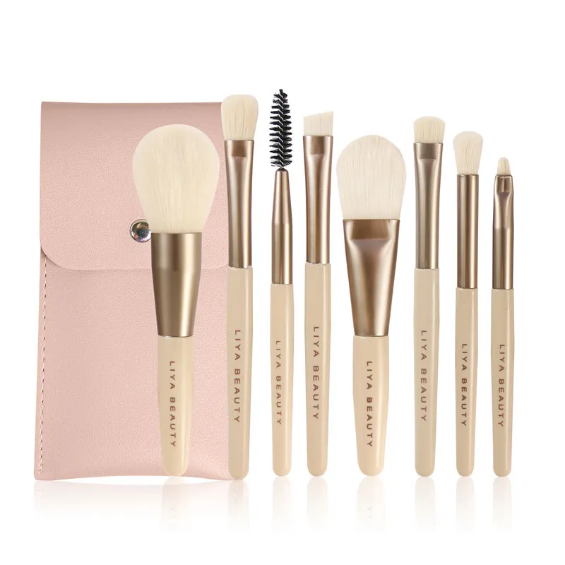 Elegant 8-piece milky white makeup brush set displayed