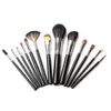 Detailed view of the Elegant Black Makeup Brush Set with wooden handles