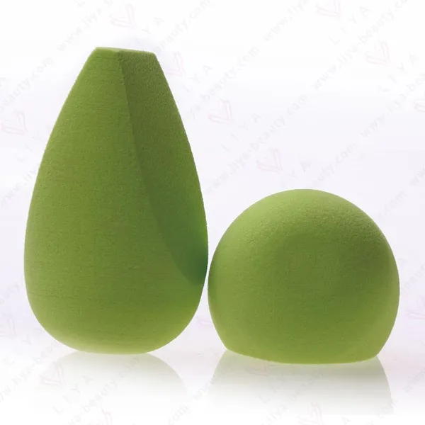 Green tear dual-cut beauty sponge showing texture